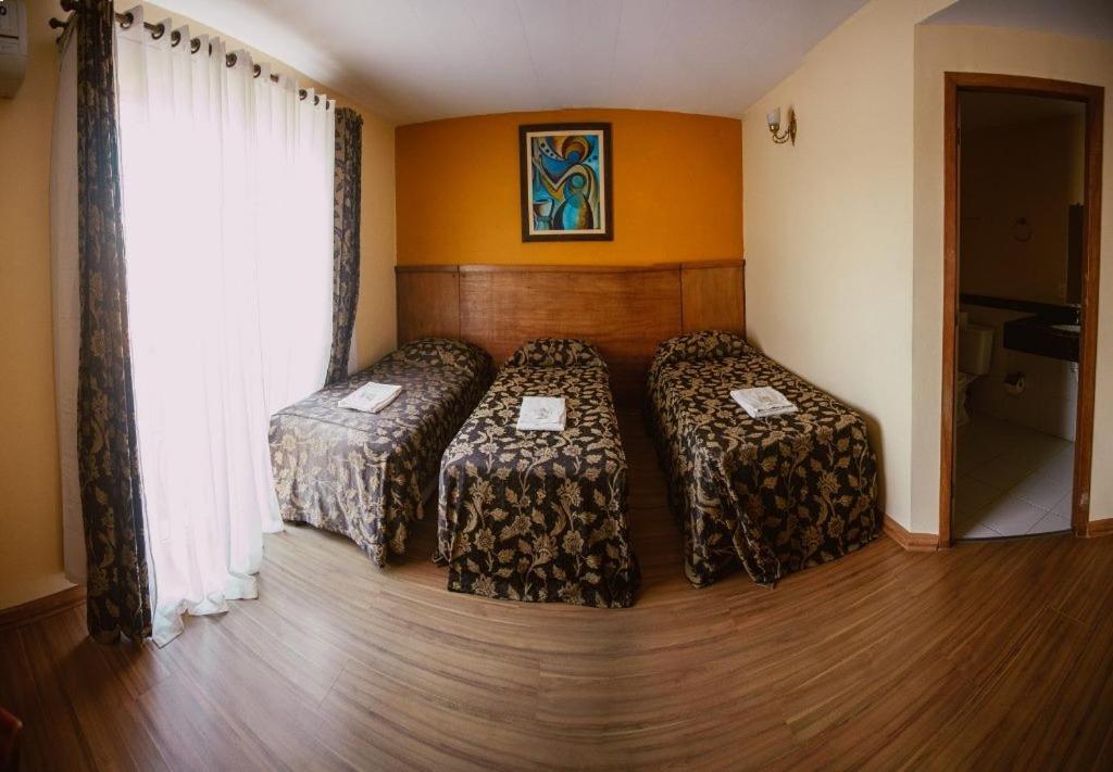 Postel nebo postele na pokoji v ubytování Pousada Raio de Sol