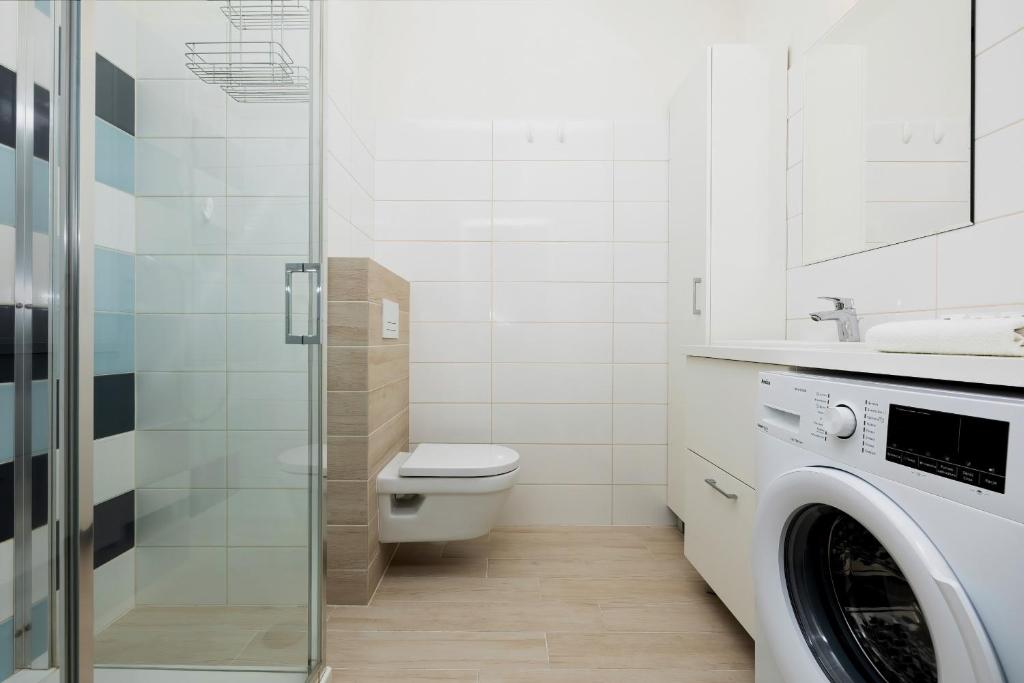 Kúpeľňa v ubytovaní Apartamenty Aquamarina Onyx by Noclegi Renters