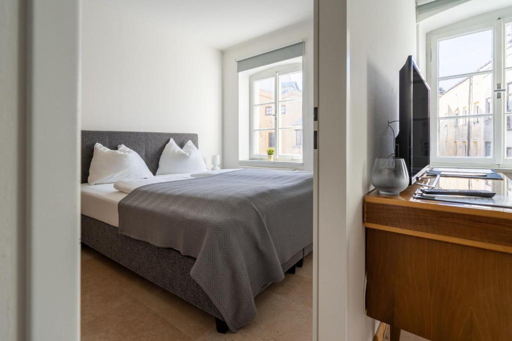 Posteľ alebo postele v izbe v ubytovaní Kaiser Max Design Appartements