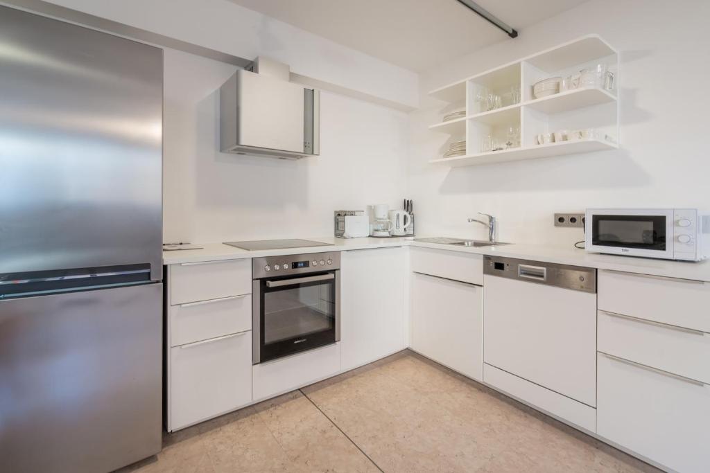 Kuchyňa alebo kuchynka v ubytovaní Kaiser Max Design Appartements