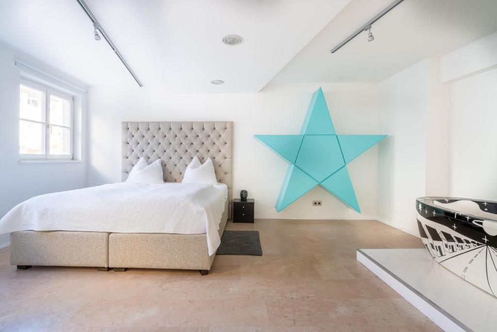 Posteľ alebo postele v izbe v ubytovaní Kaiser Max Design Appartements