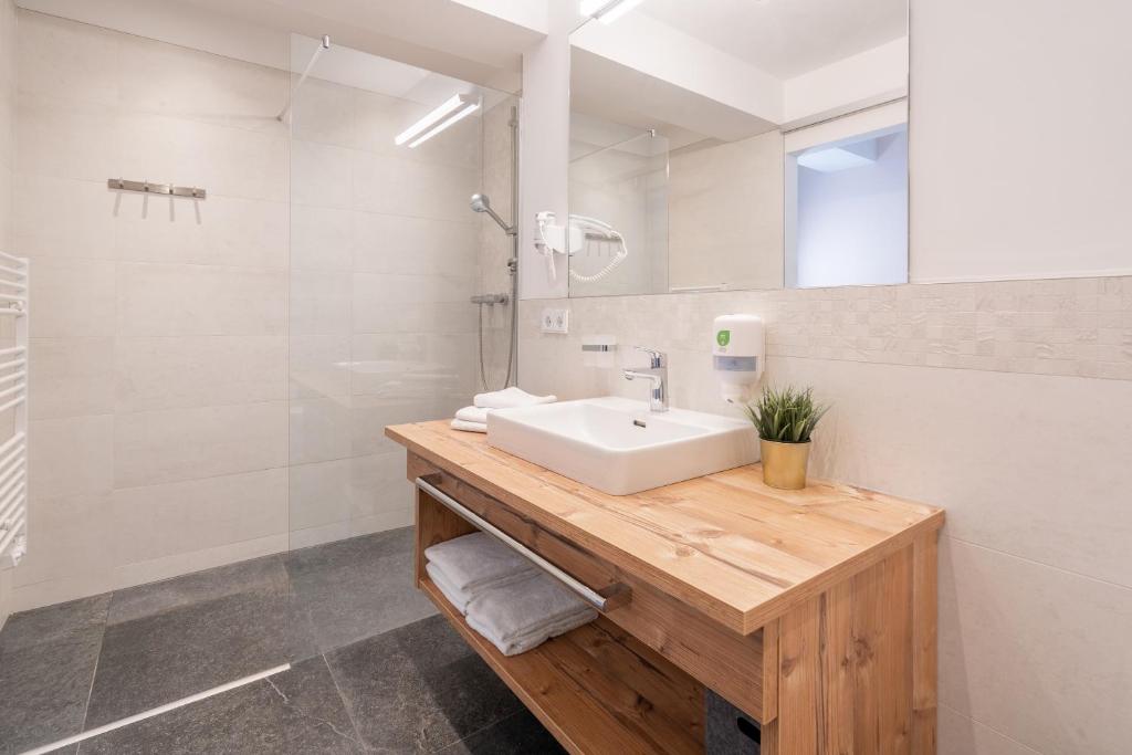 Kúpeľňa v ubytovaní Kaiser Max Design Appartements