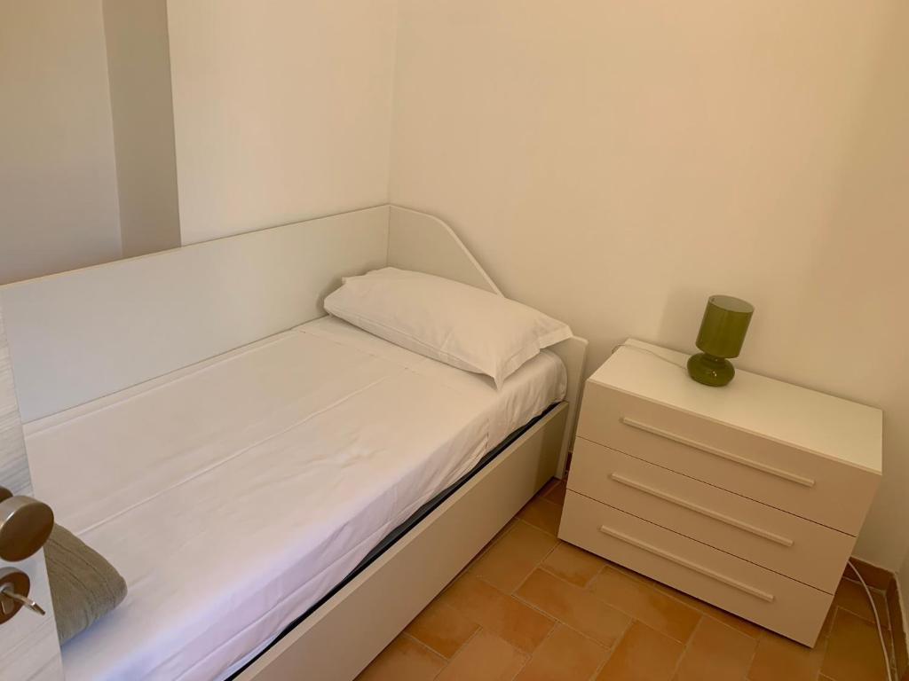 Łóżko lub łóżka w pokoju w obiekcie casa paola