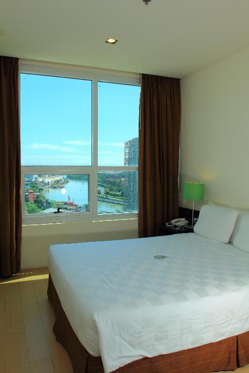 Postel nebo postele na pokoji v ubytování Go Hotels Plus Mandaluyong