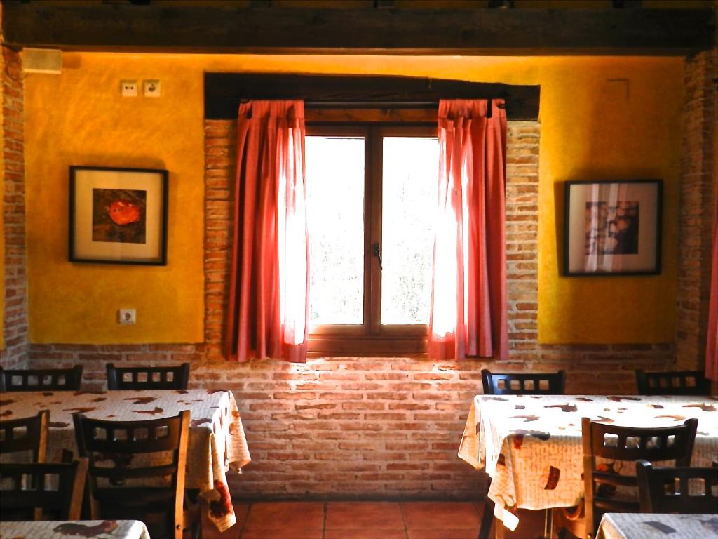 Restaurace v ubytování Hostel El Lago, Caceres