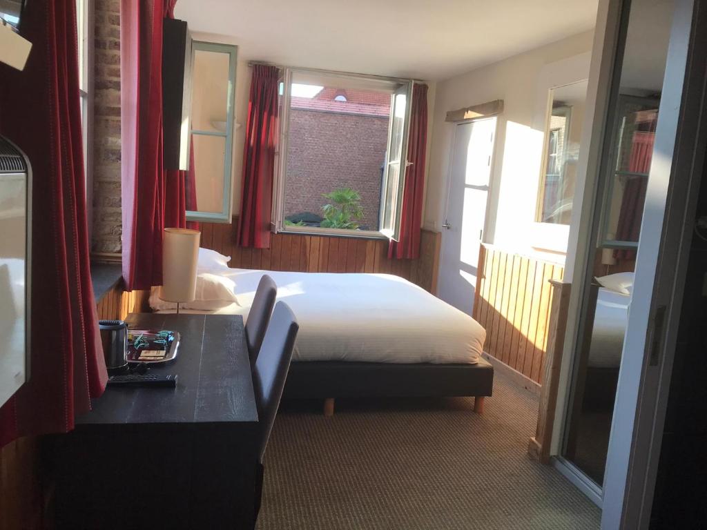 Postel nebo postele na pokoji v ubytování Hotel Koffieboontje