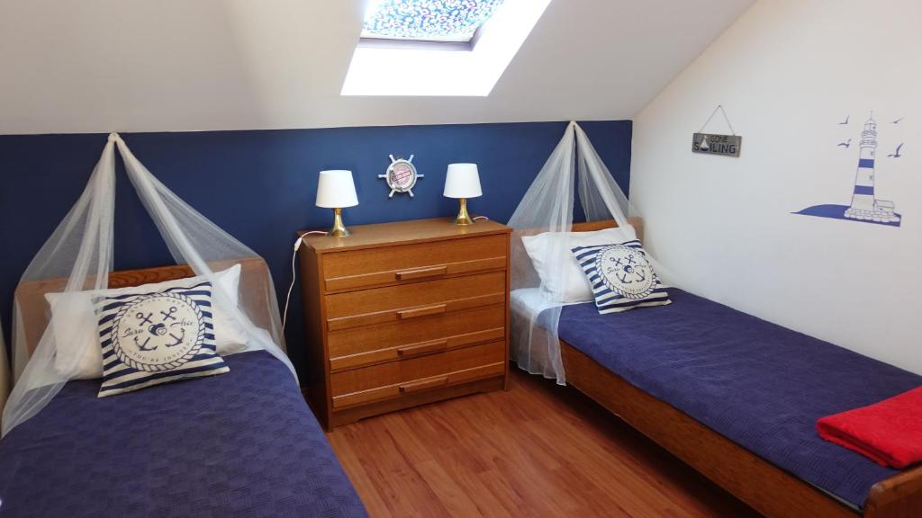 Postel nebo postele na pokoji v ubytování Vodice Family Apartment