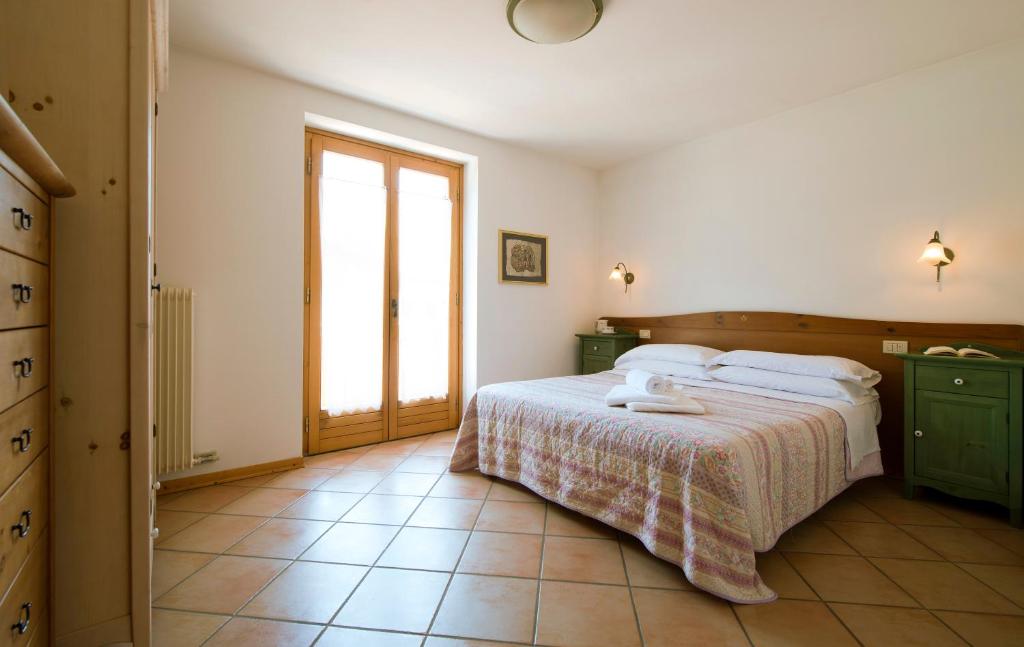 Postel nebo postele na pokoji v ubytování Residence Rio Piccolo