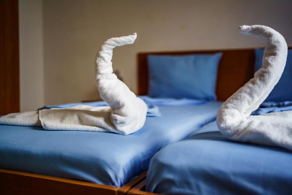 Postel nebo postele na pokoji v ubytování Hotel Park 2