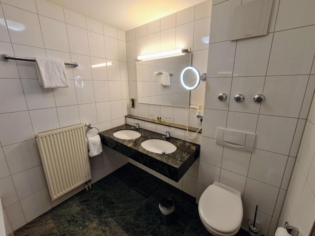 Koupelna v ubytování Hotel Restaurant Felix