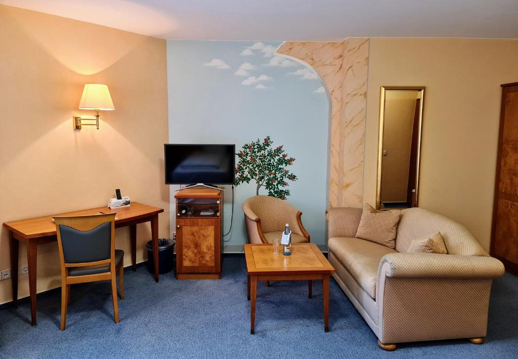 TV a/nebo společenská místnost v ubytování Hotel Restaurant Felix