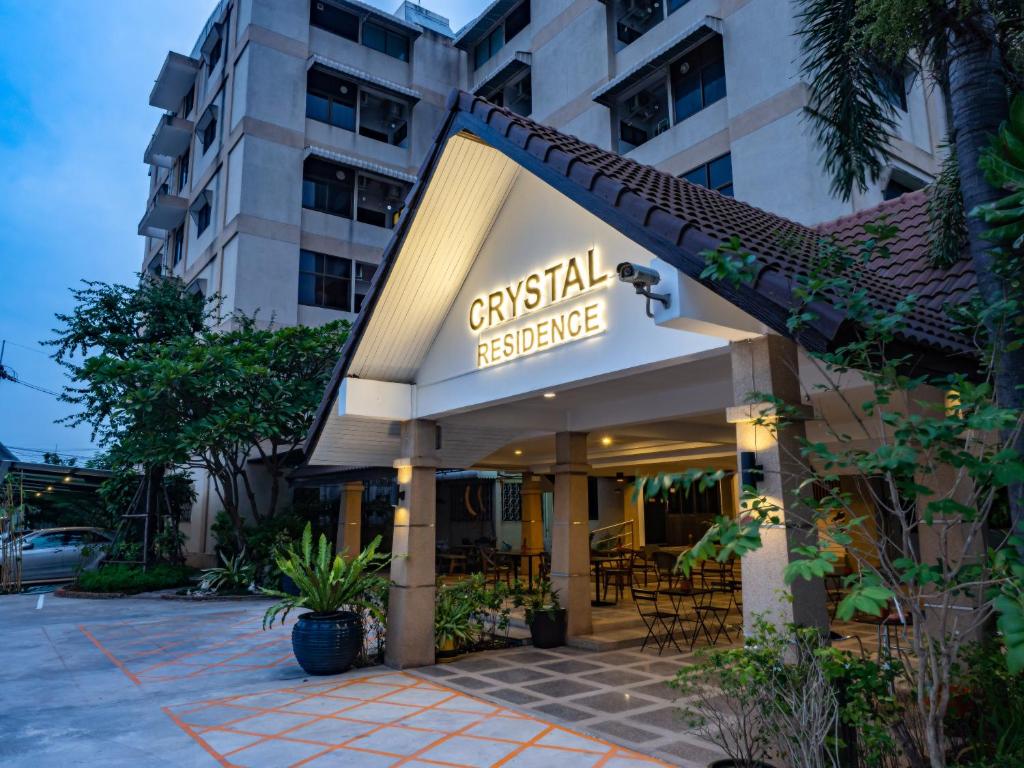 a hotel with a sign that reads special exchange at Crystal Resort Korat in Nakhon Ratchasima