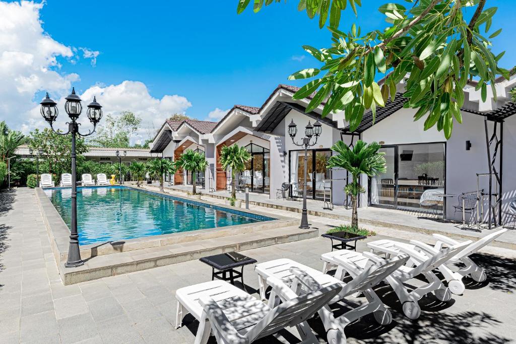 an image of a swimming pool in a villa at Sandy Clay Bungalows in Sihanoukville