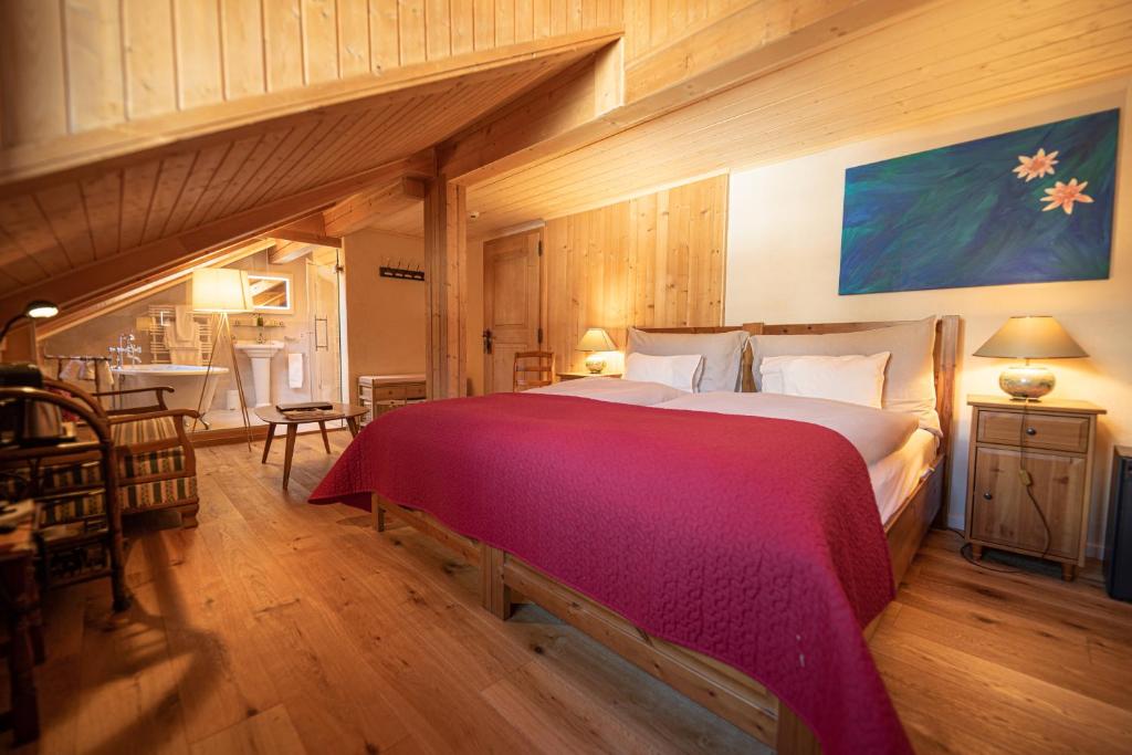 Postel nebo postele na pokoji v ubytování Hotel Alpenrose mit Gourmet-Restaurant Azalée