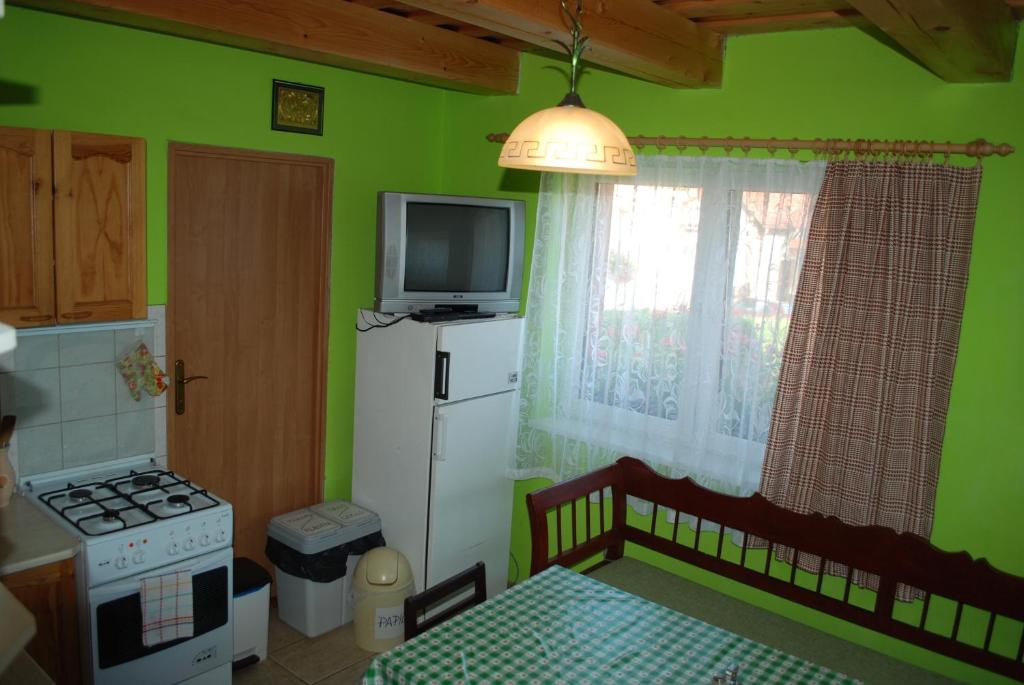 A television and/or entertainment centre at Aniel Privat