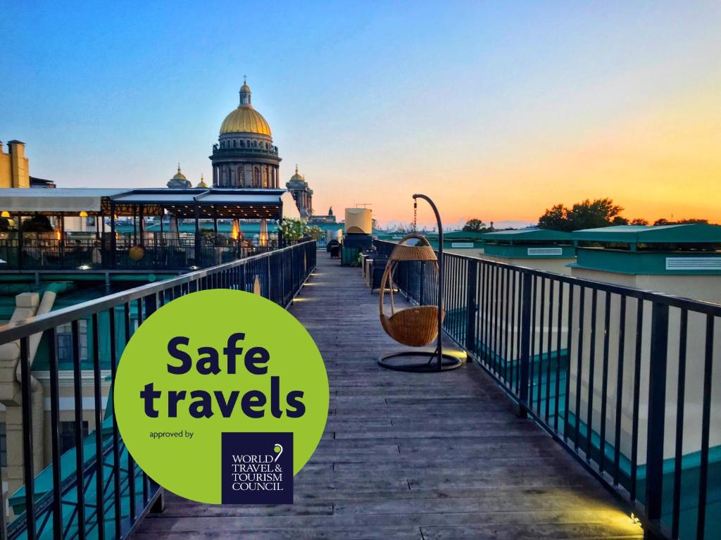 a boardwalk with a view of the capitol building at Petr Hotel in Saint Petersburg