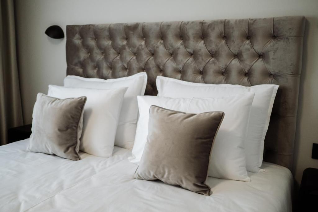 Ένα ή περισσότερα κρεβάτια σε δωμάτιο στο Hotel Barcode Wellness & Spa