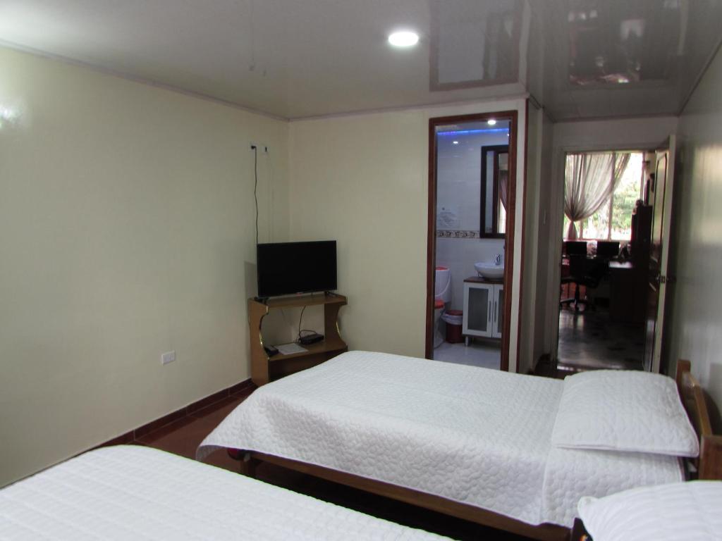 Postel nebo postele na pokoji v ubytování Touristic House