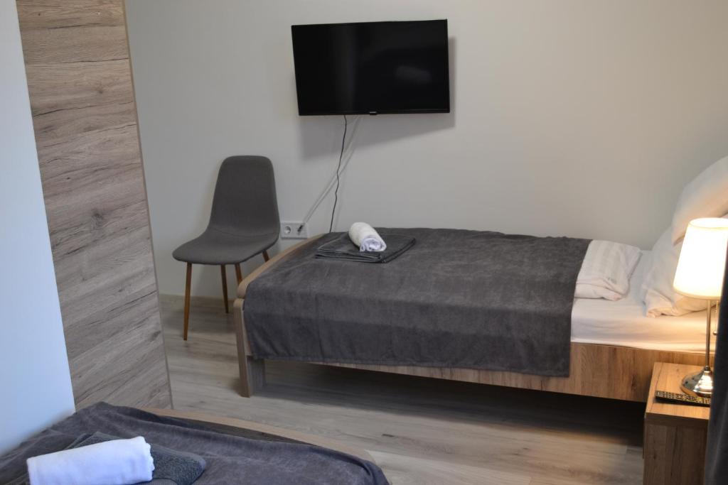 Postel nebo postele na pokoji v ubytování Főnix Design Rooms