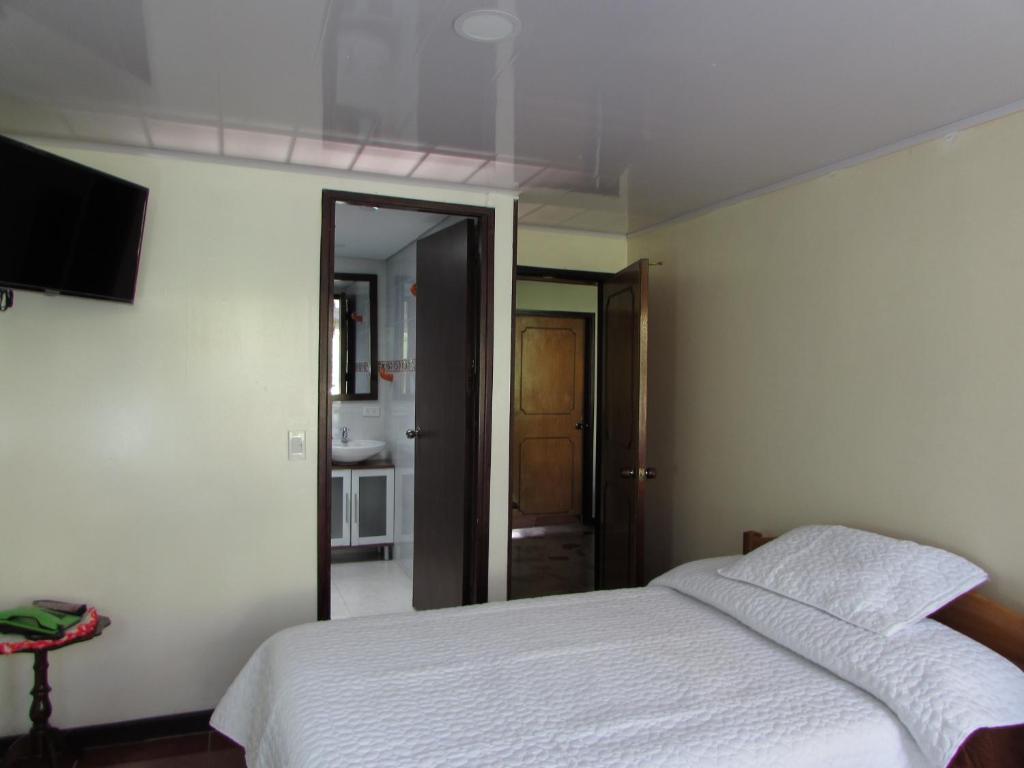Postel nebo postele na pokoji v ubytování Touristic House