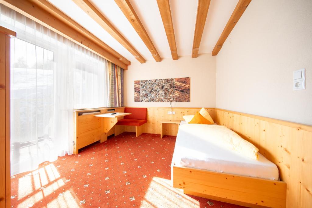 Postel nebo postele na pokoji v ubytování Haus Stefanie