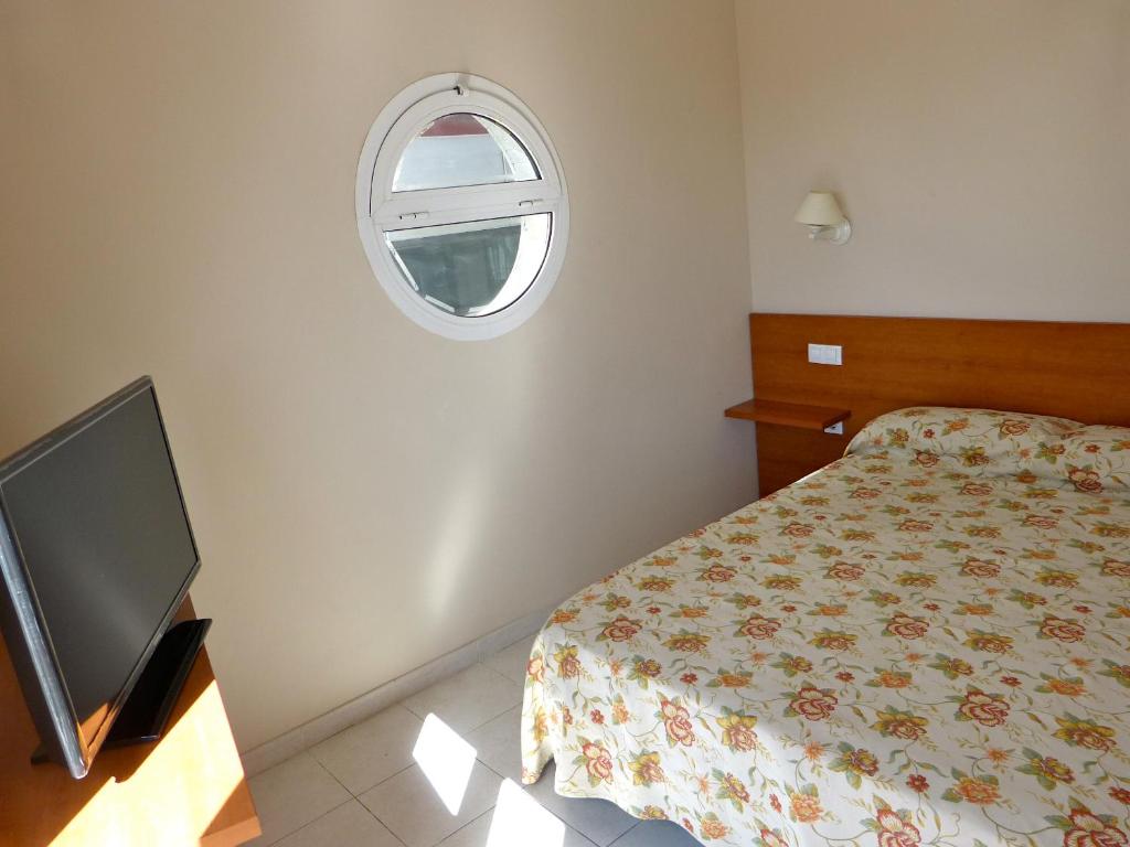 Posteľ alebo postele v izbe v ubytovaní Hotel Tamasite