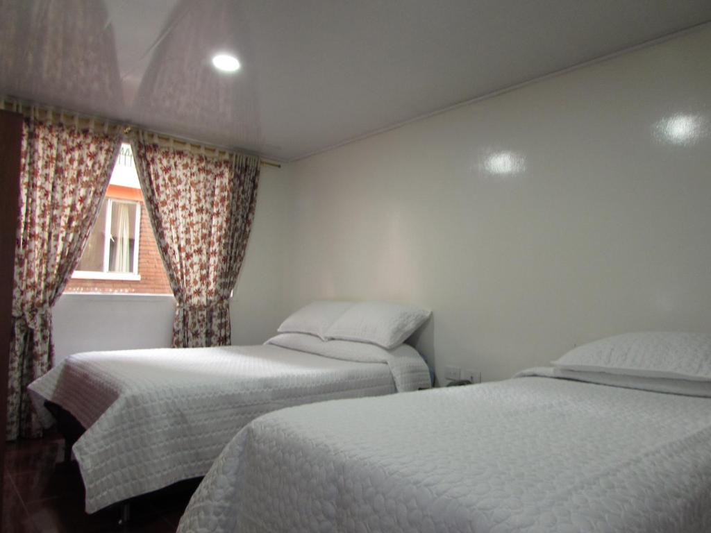 Postel nebo postele na pokoji v ubytování Touristic House