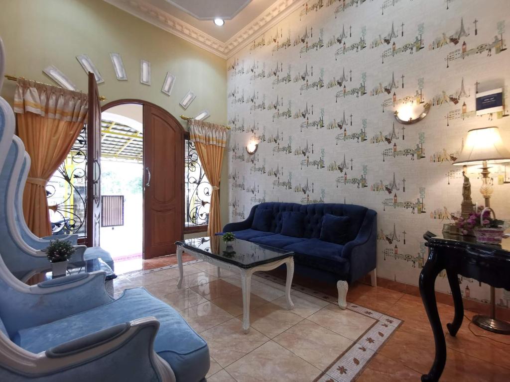 Posezení v ubytování Nariska Suite Homestay