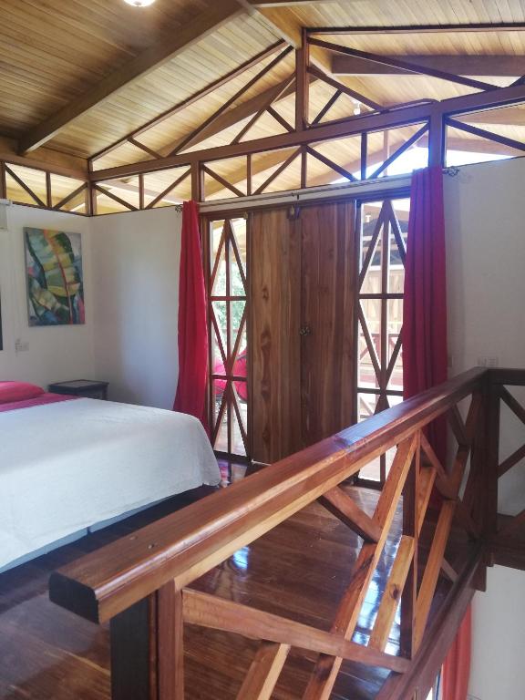 Postel nebo postele na pokoji v ubytování Ibiza Tropical Beach Villas