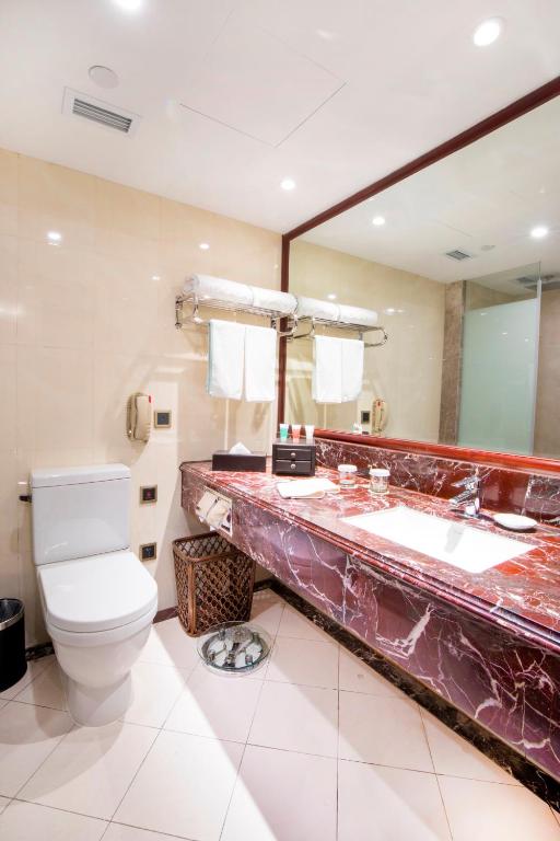 Koupelna v ubytování Jin Jiang Pine City Hotel