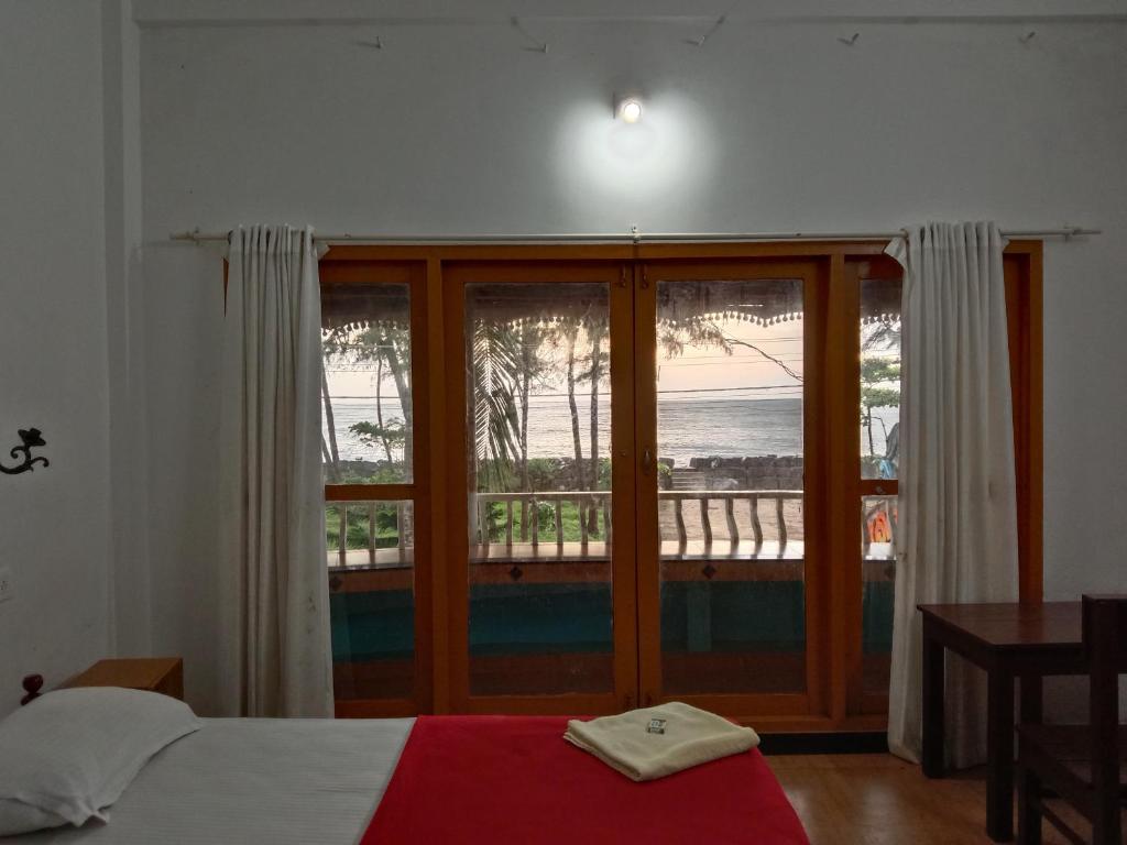 Krevet ili kreveti u jedinici u objektu Cherai Ocean View Home