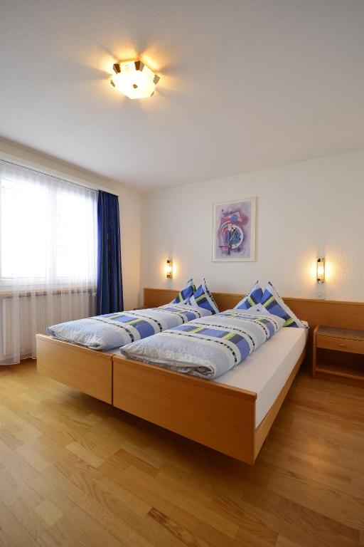 Postel nebo postele na pokoji v ubytování Haus Orion