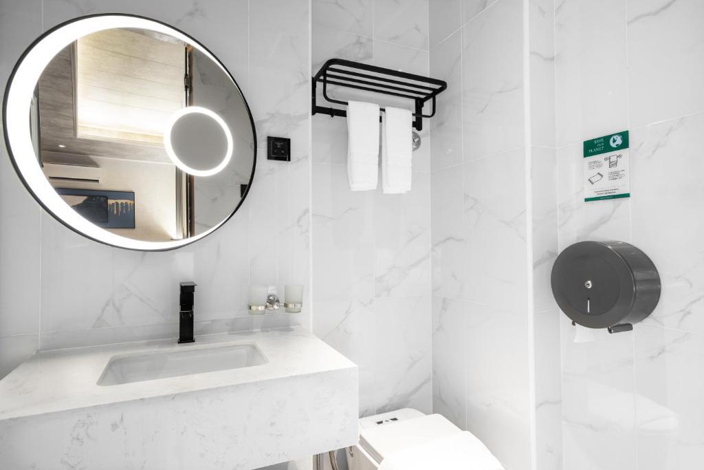 Koupelna v ubytování A&R Urban Hotel