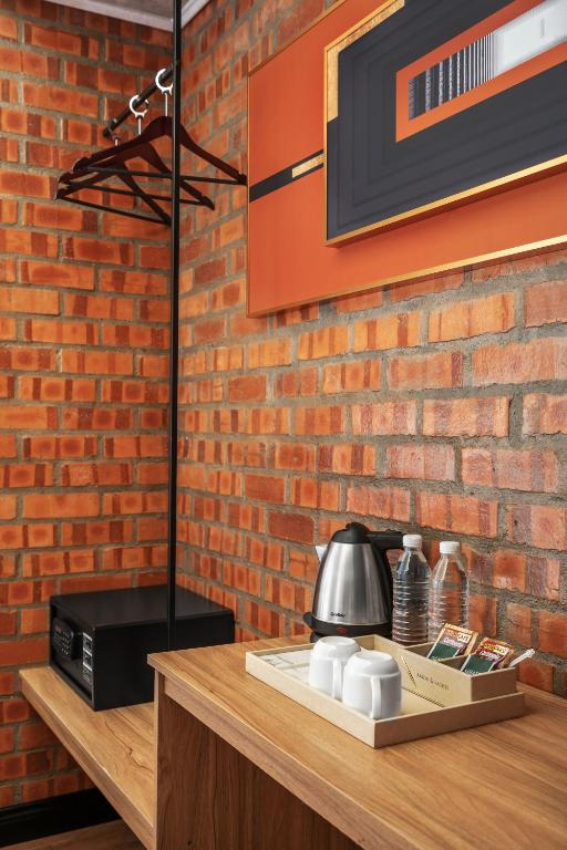 Příslušenství pro přípravu čaje a kávy v ubytování A&R Urban Hotel