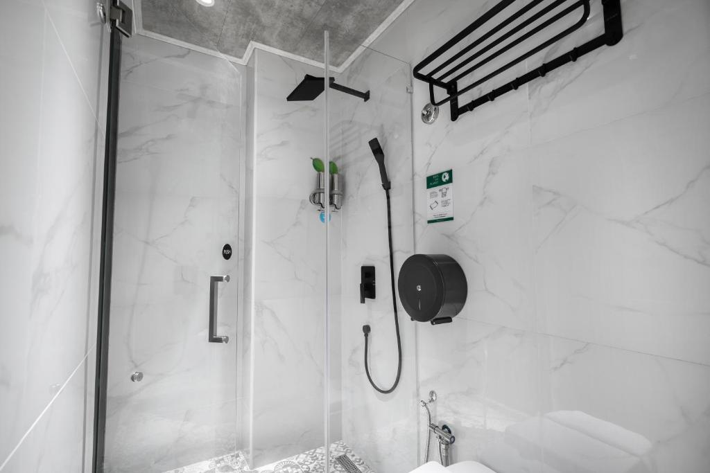 Koupelna v ubytování A&R Urban Hotel