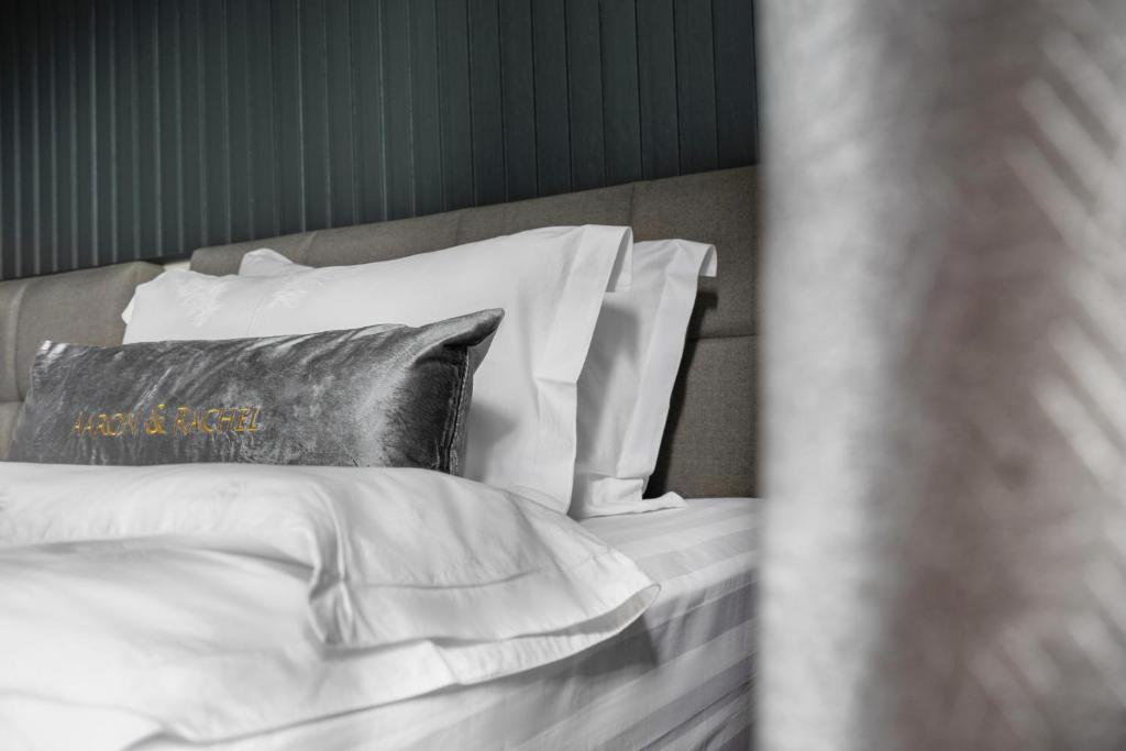 Postel nebo postele na pokoji v ubytování A&R Urban Hotel