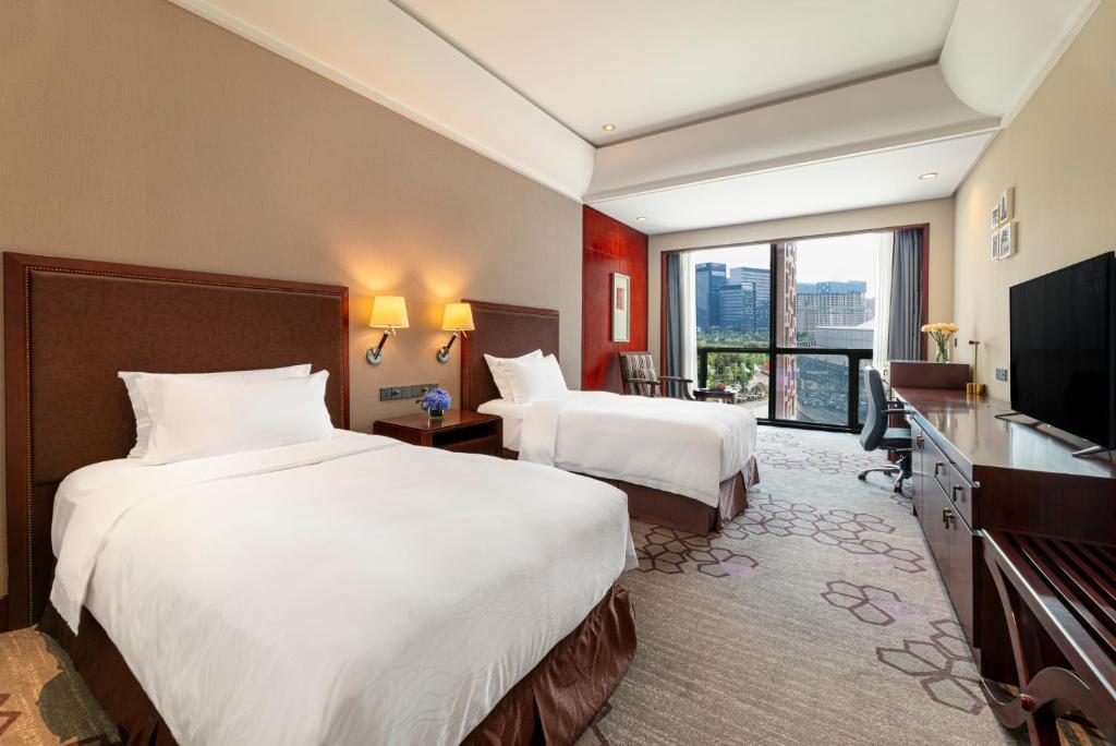 TV a/nebo společenská místnost v ubytování Jin Jiang International Hotel Xi'an