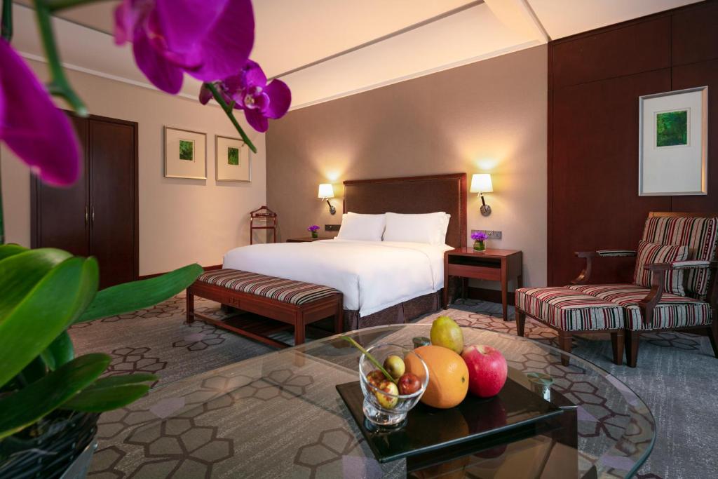 Postel nebo postele na pokoji v ubytování Jin Jiang International Hotel Xi'an