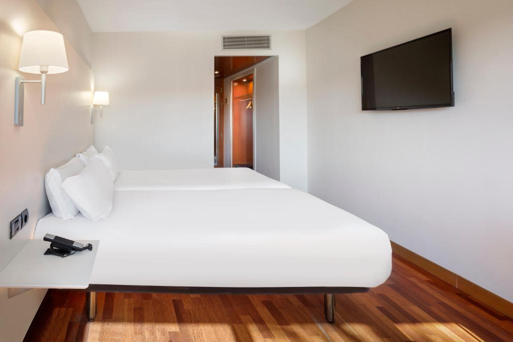 TV a/nebo společenská místnost v ubytování B&B HOTEL Jerez