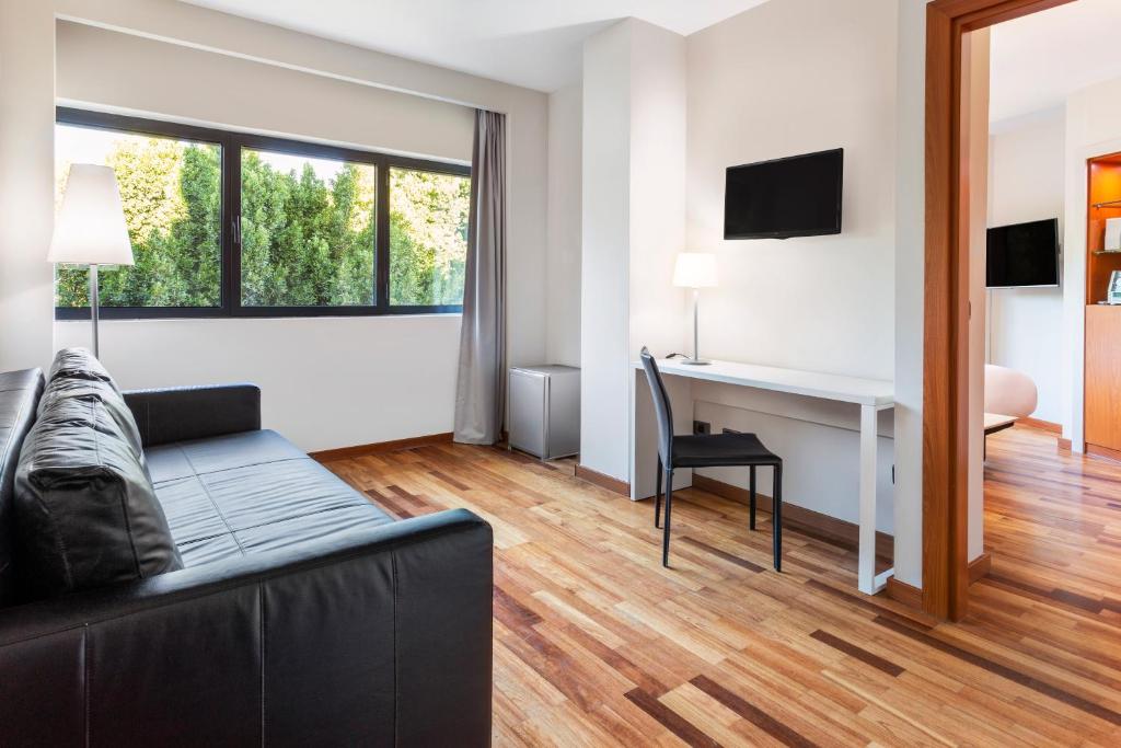 TV a/nebo společenská místnost v ubytování B&B HOTEL Jerez