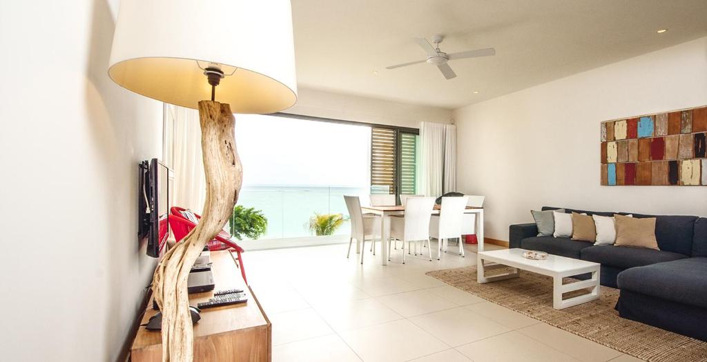 Posezení v ubytování Cap Ouest Beachfront Residences