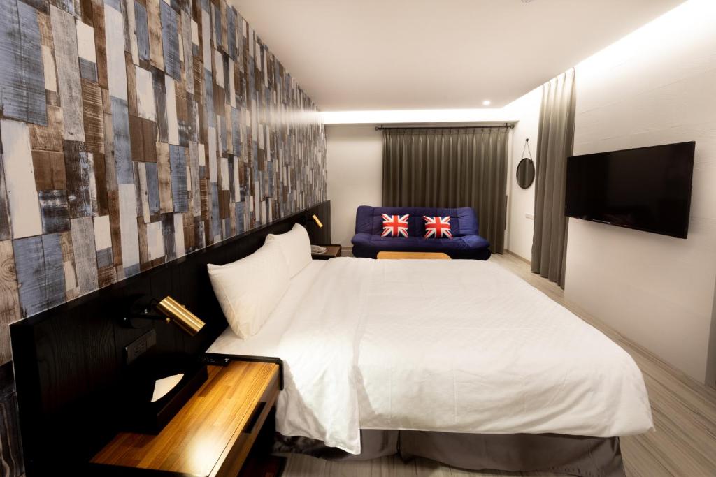 Postel nebo postele na pokoji v ubytování Only Love Motel