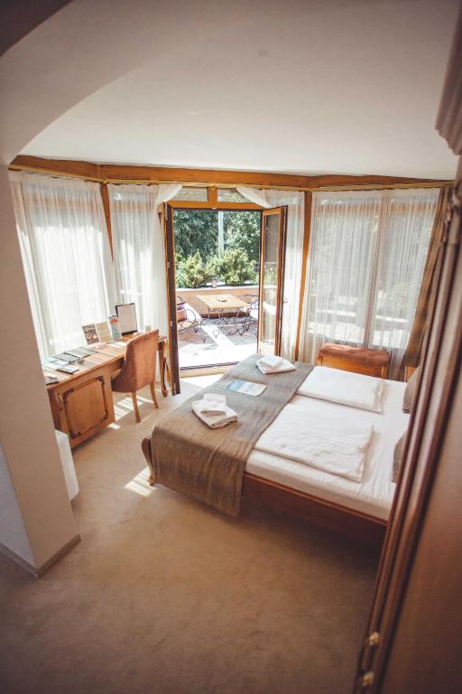 Postel nebo postele na pokoji v ubytování Provence rooms