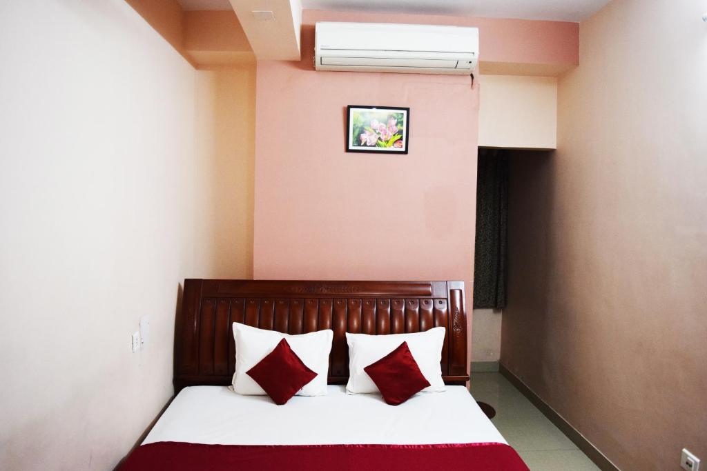 Postel nebo postele na pokoji v ubytování Hotel Avisha