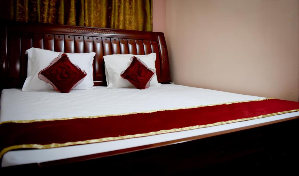 Postel nebo postele na pokoji v ubytování Hotel Avisha