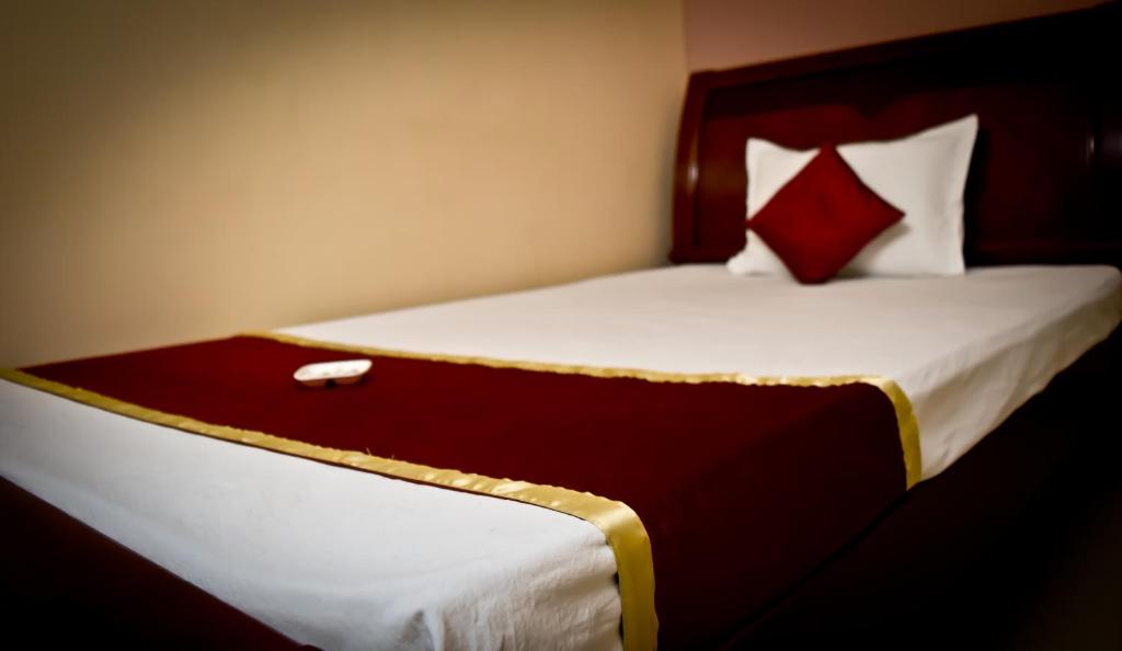 Postel nebo postele na pokoji v ubytování Hotel Avisha