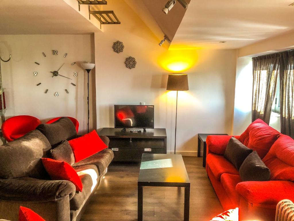 Telewizja i/lub zestaw kina domowego w obiekcie Apartamentos Sierra Nevada Prime Bluettravel