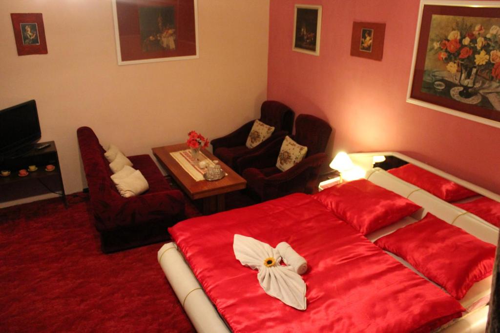Postel nebo postele na pokoji v ubytování Hotel Corrado