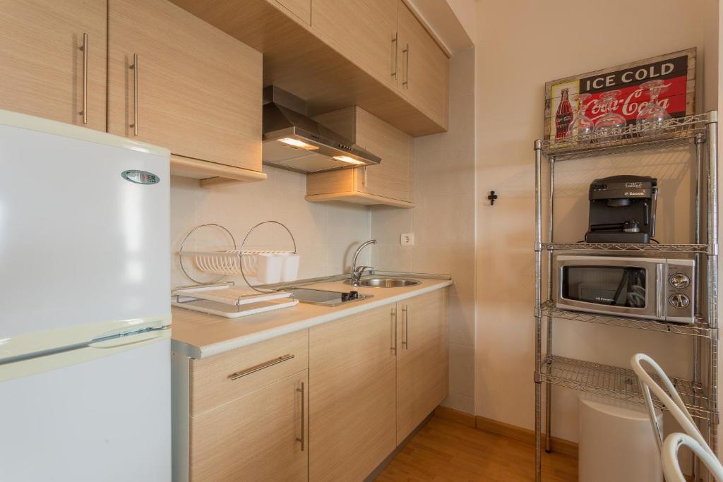 Kuchnia lub aneks kuchenny w obiekcie Apartamentos Sierra Nevada Prime Bluettravel