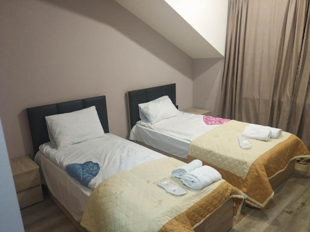 Postel nebo postele na pokoji v ubytování Favourite